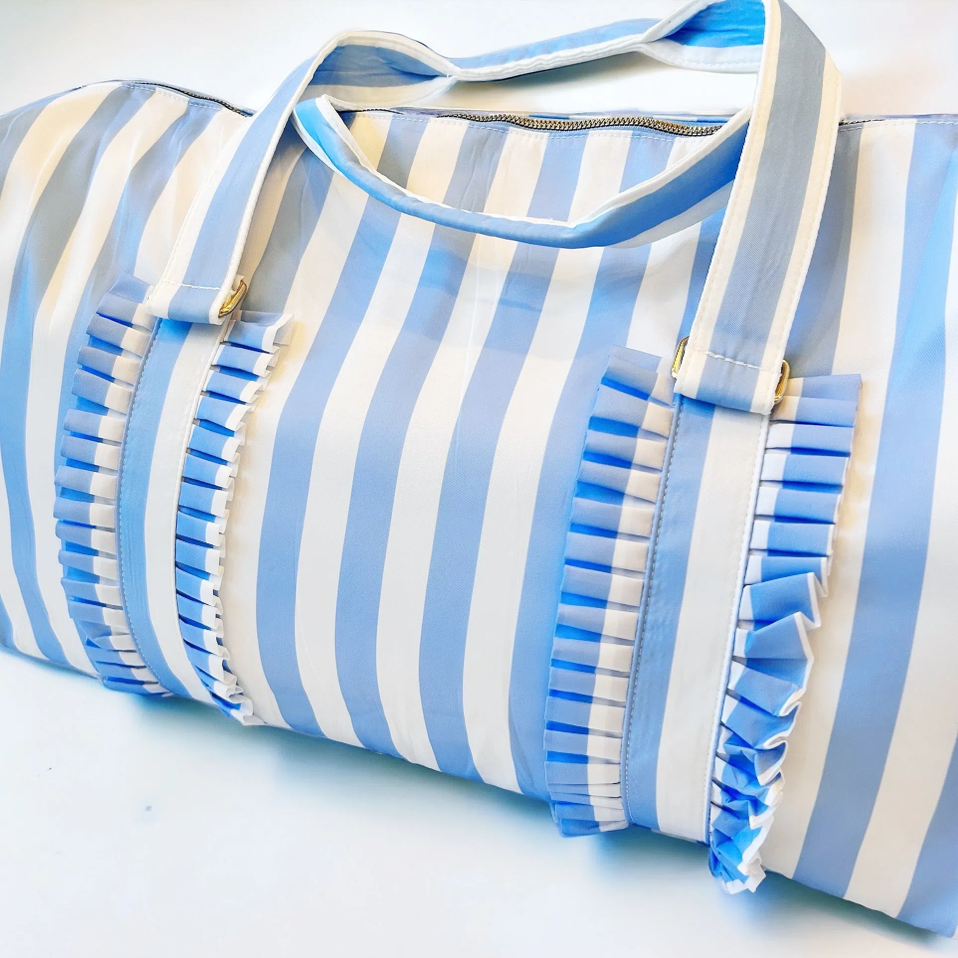 Blue Striped Duffle Bag