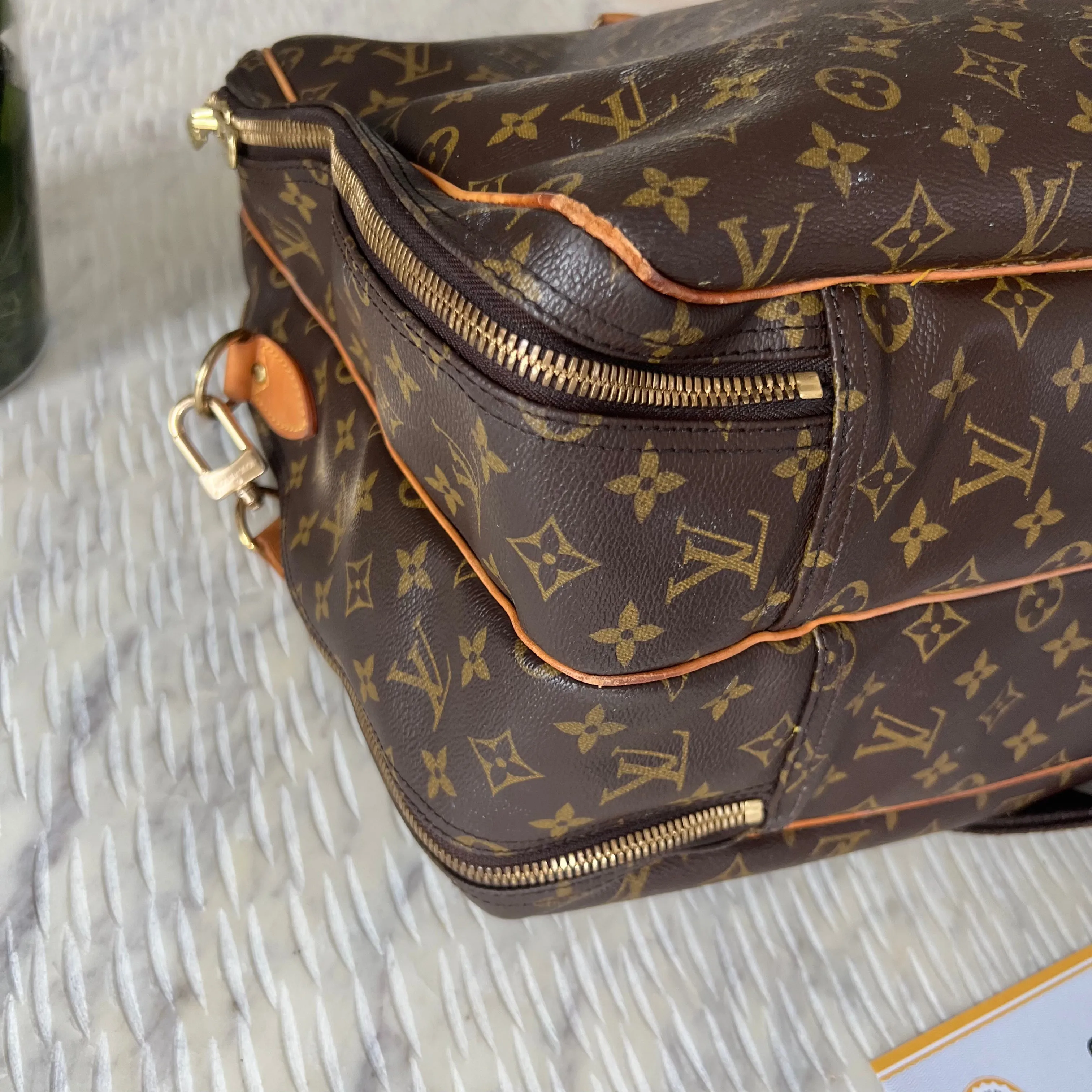 Louis Vuitton Alize Heures 24 Bag